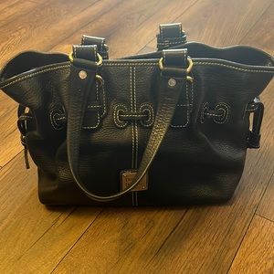 Dooney & Bourke black leather handbag with pink interior